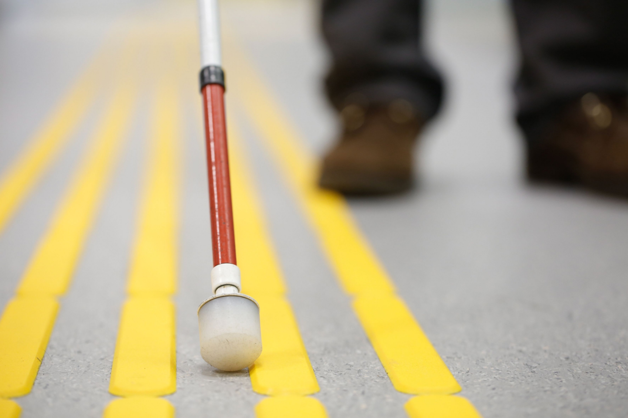 Pedestrian with a white cane