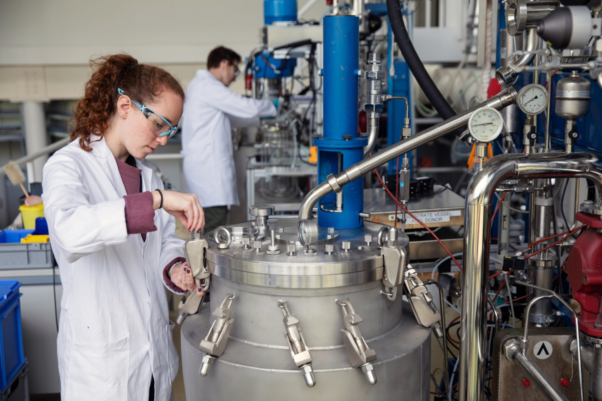 Two students working in a laboratory.