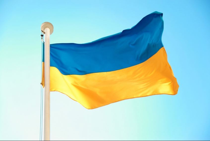Ukrainian flag flies in the sky