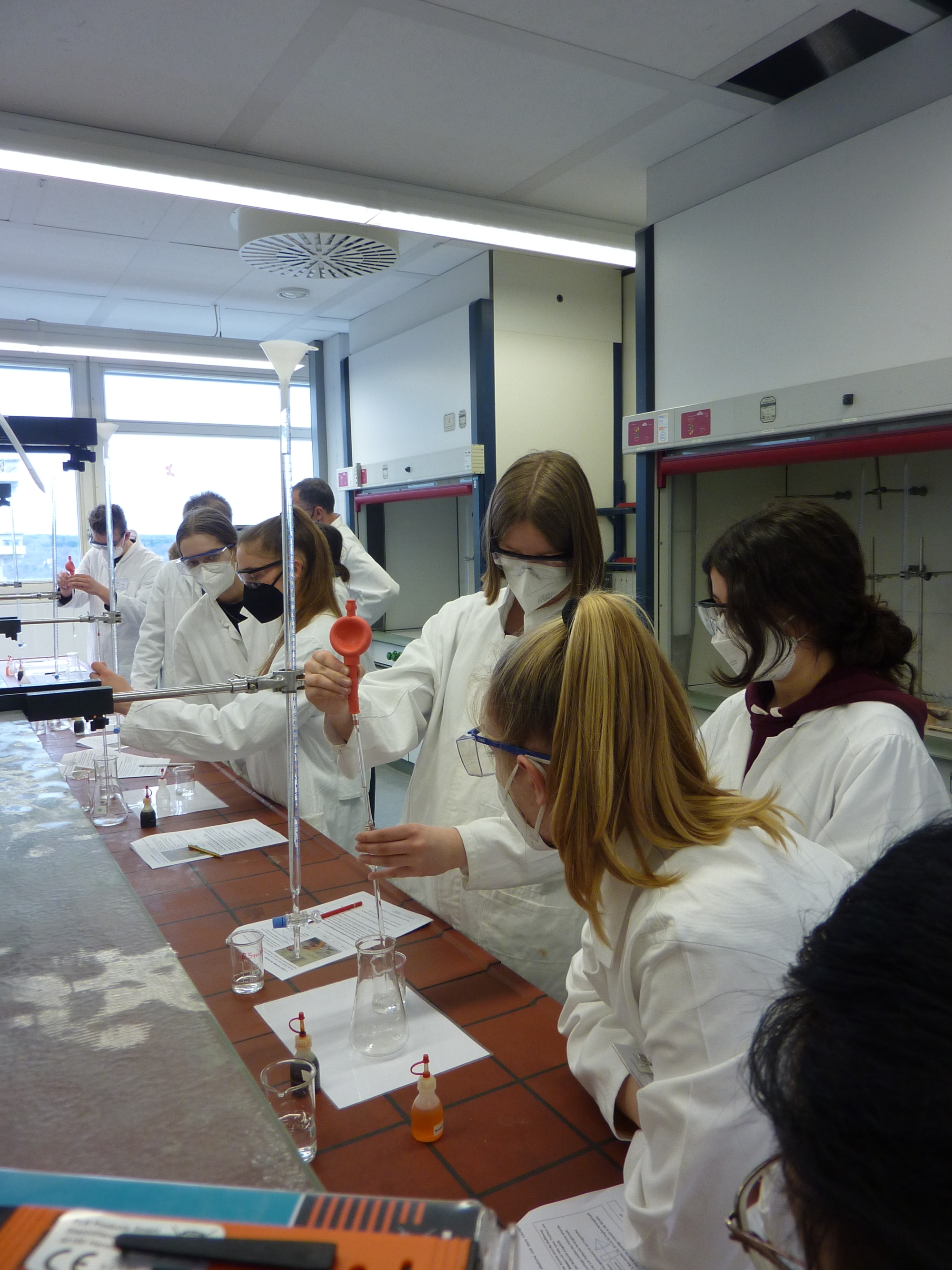 Participants of the Elite Academy of Chemistry and Materials Science in a chemistry laboratory.