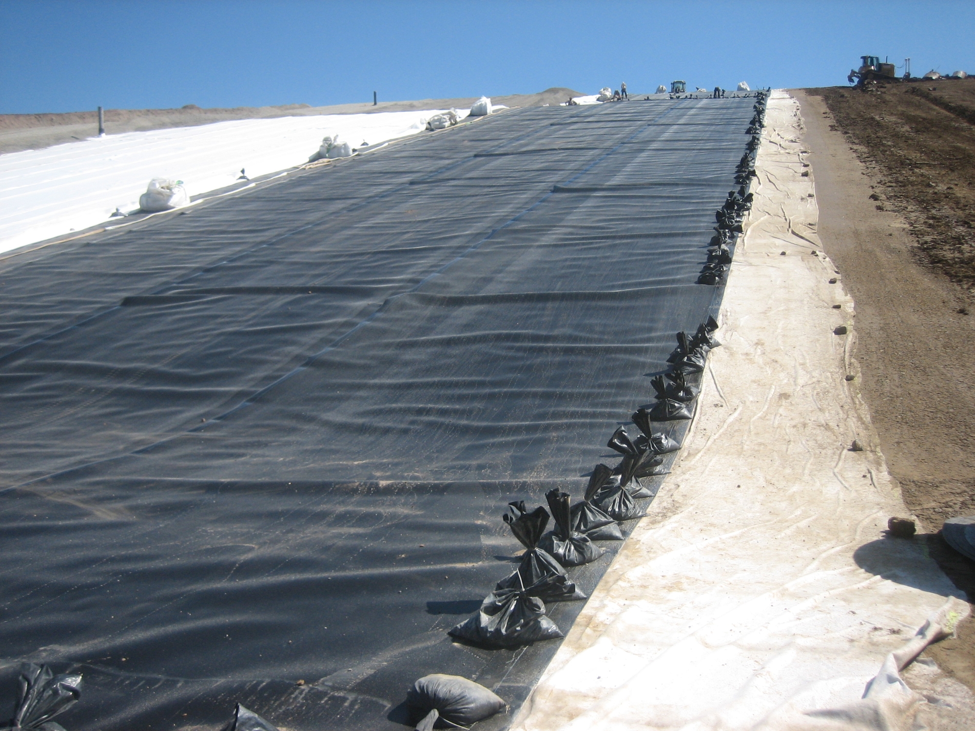 Construction of surface sealing at a class II landfill site.
