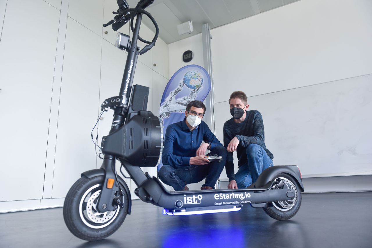 Two scientists present the e-scooter