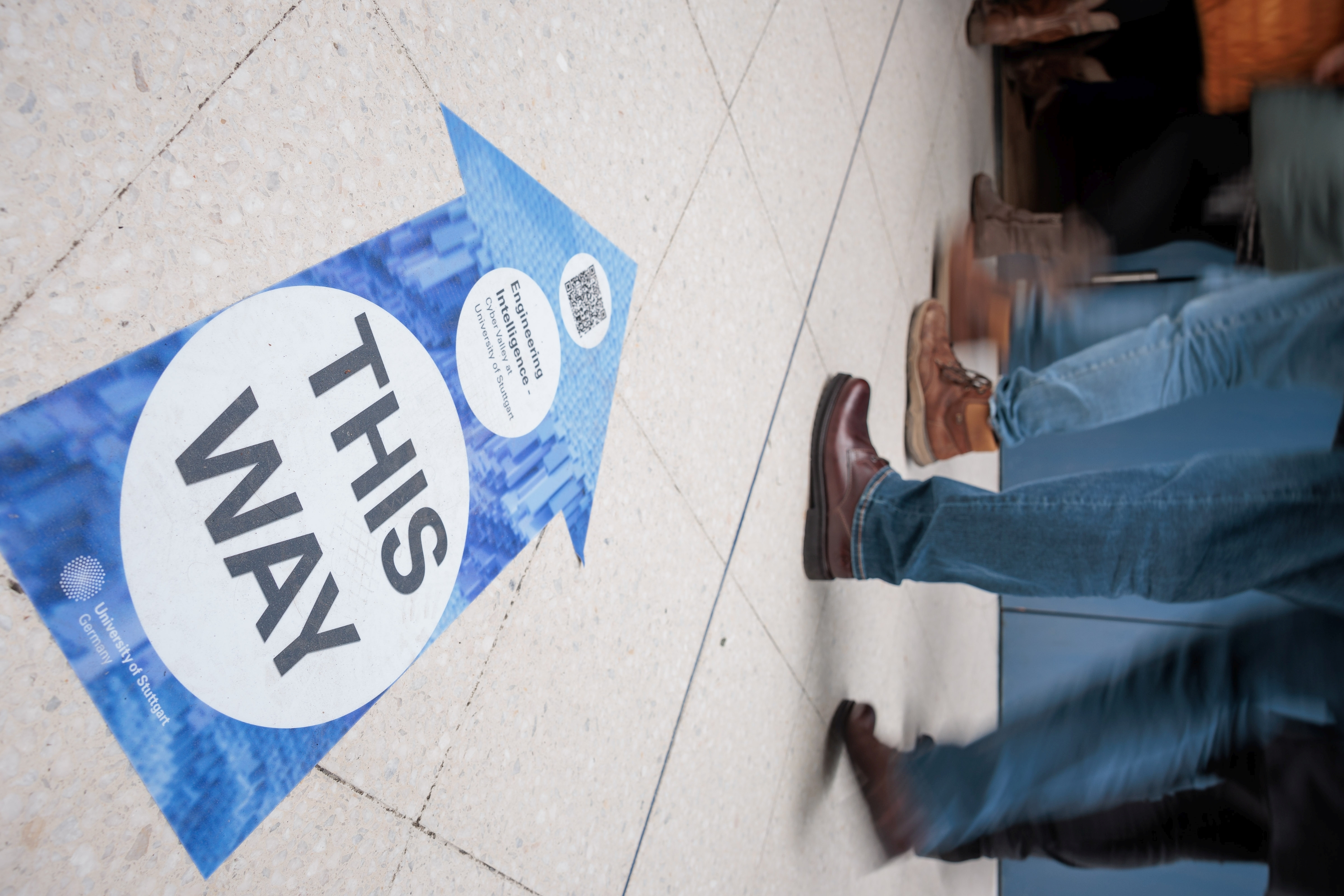 Floor sticker with the inscription "This way"