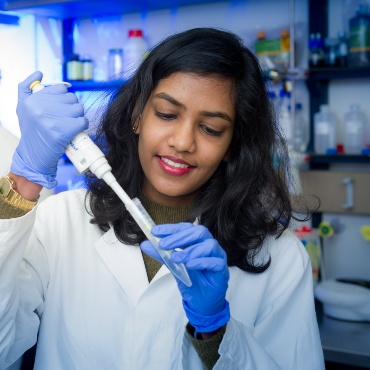 Young female researcher in a lab